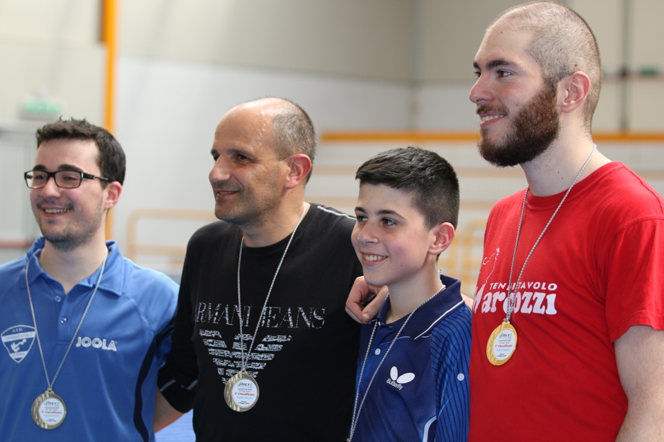 Il podio dei Quarta maschili (Foto Gianluca Piu)